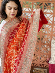 Orange, Red Handwoven NeemZari Bareek Bandhani with Gotapatti Handwork in Pure Georgette