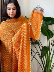 Orange Rai Bandhej Dupatta with Handpainted Kalamkari Pallu in Pure Muga Silk - Masakalee