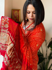 Orange, Red Rai Bandhej Dupatta with Dabka and Gotapatti Handwork in Silk