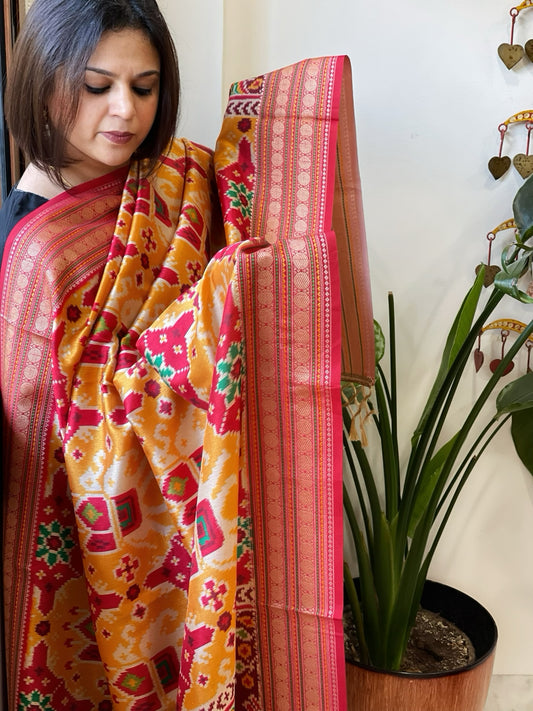 Orangish Yellow Printed Patola Dupatta in Fine Art Silk