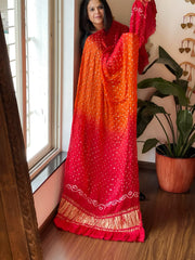 Orange, Red Bandhani Dupatta with Zari Pallu in Modal Silk