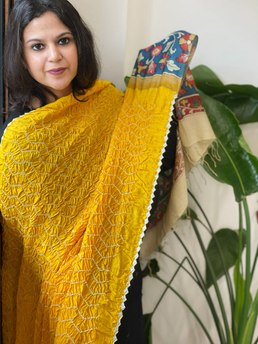 Yellow Rai Bandhej Dupatta with Handpainted Kalamkari Pallu in Pure Muga Silk