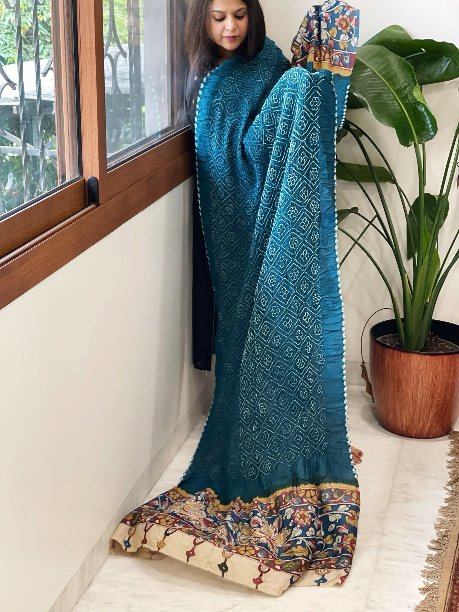 Dark Firozi Rai Bandhej Dupatta with Handpainted Kalamkari Pallu in Pure Muga Silk - Masakalee