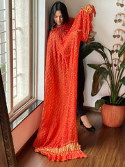 Orangish Peach Bandhani Dupatta with Zari Pallu in Modal Silk - Masakalee