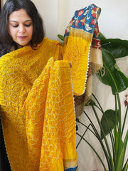 Yellow Rai Bandhej Dupatta with Handpainted Kalamkari Pallu in Pure Muga Silk - Masakalee