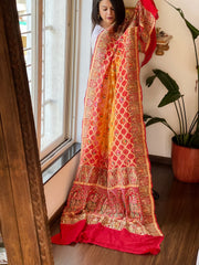 Yellow, Red Rai Bandhej Dupatta with Meenakari Jaal design in Georgette - Masakalee